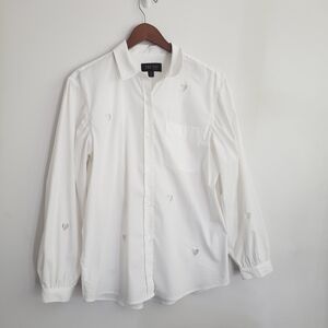 White Shirt with Heart Cutouts